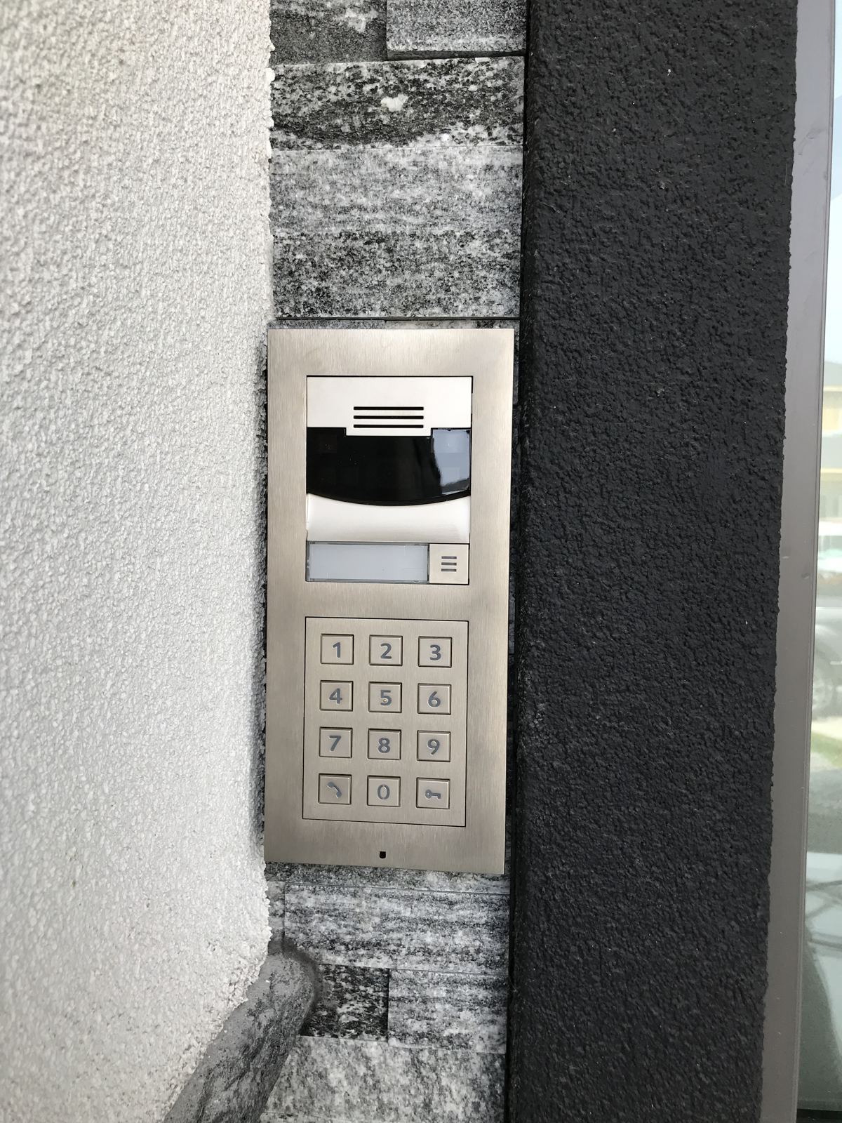 Close-up of entry intercom and keypad