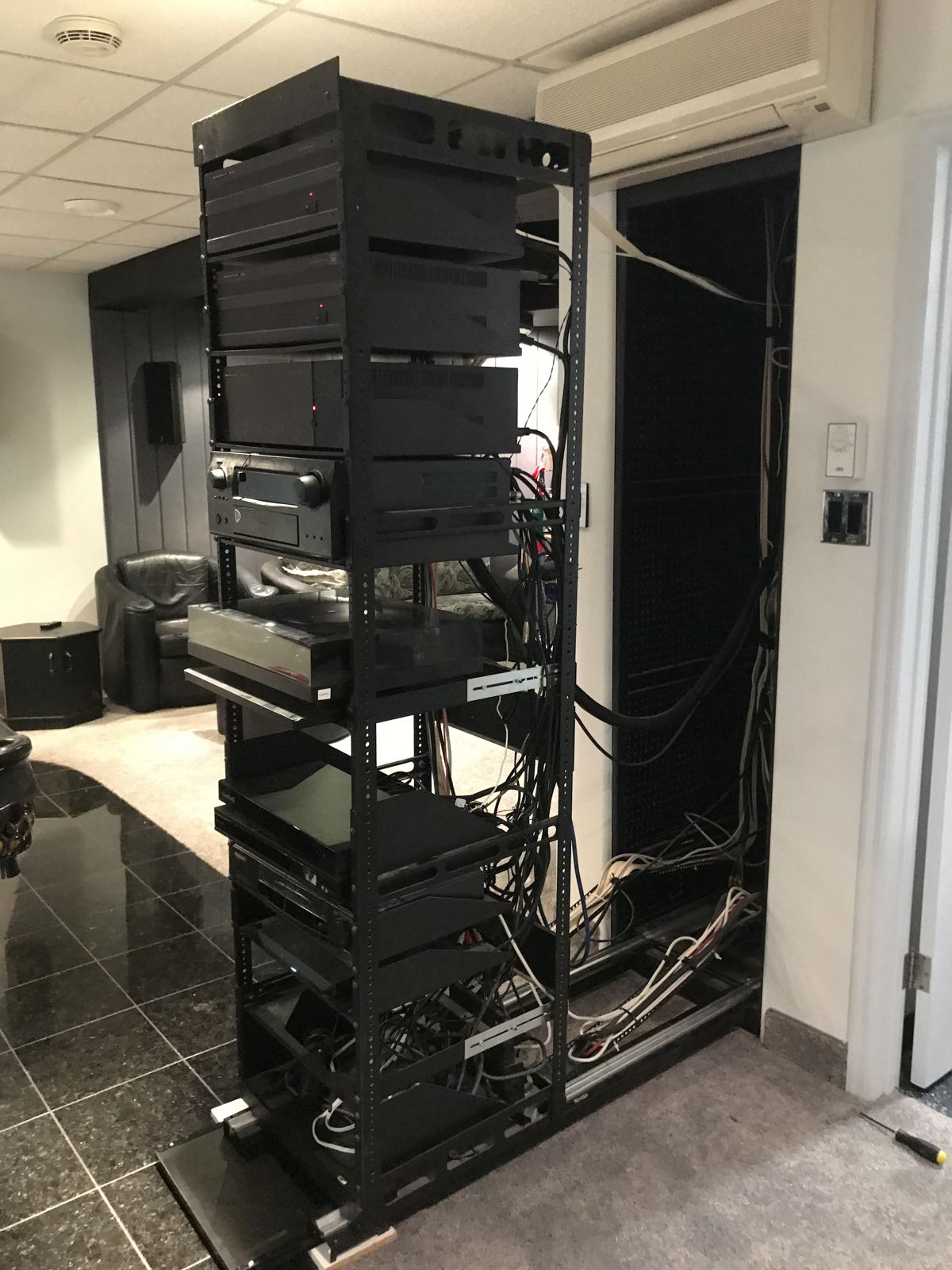 Open-frame equipment rack with cable management
